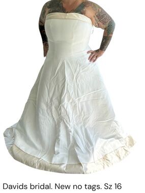 David's Bridal White Strapless A-Line Bridal Gown with Cream Hem